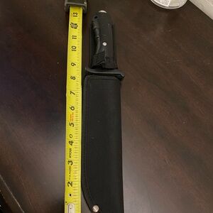 Sleek Black Knife with Sheath